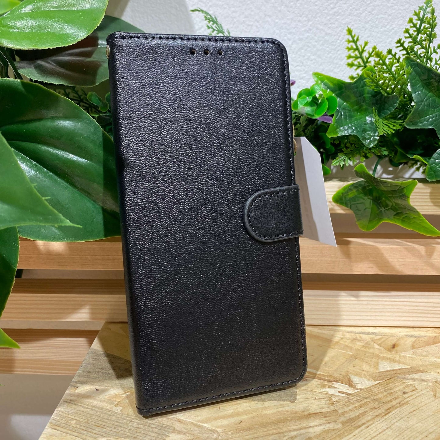 Acheter une coque portefeuille Ă Aix en Provence pour l'iPhone 12 Pro Max couleur noir chez Neo Mobile